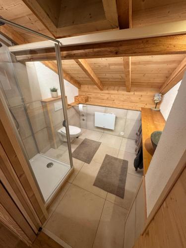 an overhead view of a bathroom in a house at La grange chez Chantal in Ollon