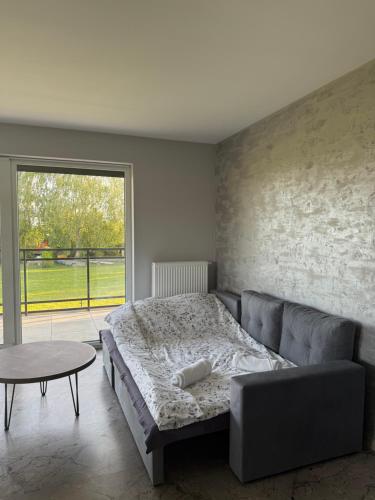 Postel nebo postele na pokoji v ubytování Apartament Solemare nad Zalewem Wiślanym