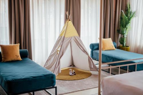 Postel nebo postele na pokoji v ubytování Hotel Cetina Palacio Ayala Berganza