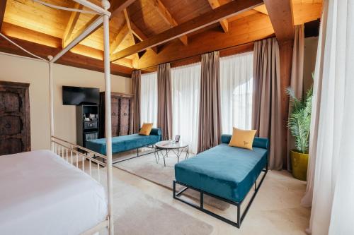 Postel nebo postele na pokoji v ubytování Hotel Cetina Palacio Ayala Berganza