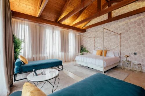 Postel nebo postele na pokoji v ubytování Hotel Cetina Palacio Ayala Berganza