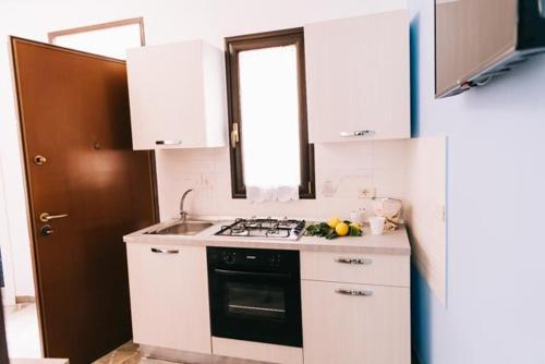 Η κουζίνα ή μικρή κουζίνα στο Maison Veneto Appartamenti
