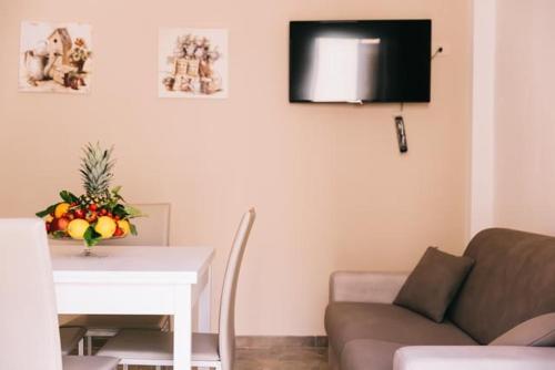 Μια τηλεόραση ή/και κέντρο ψυχαγωγίας στο Maison Veneto Appartamenti