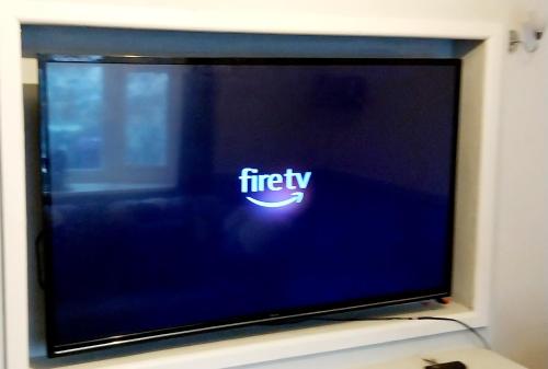 a flat screen tv with theify logo on it at Make It Your Home in Wednesfield