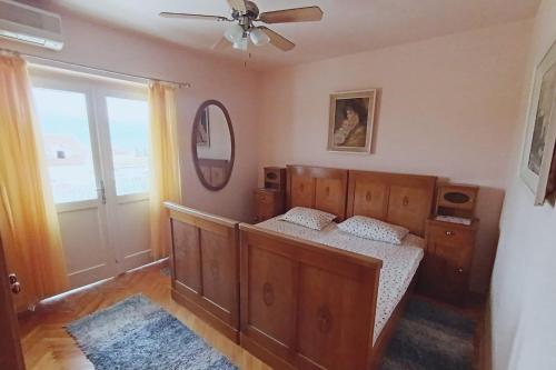 Postel nebo postele na pokoji v ubytování Apartment Magnolia