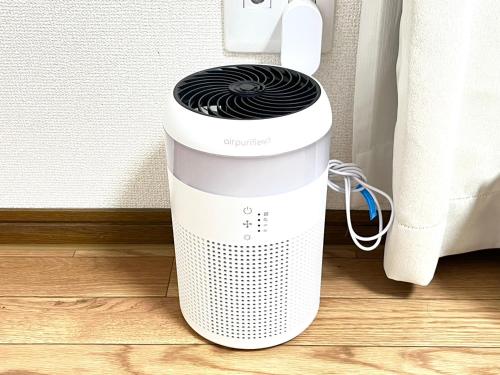 a small white and greyulatedoustic at Discover Fukuoka House in Fukuoka
