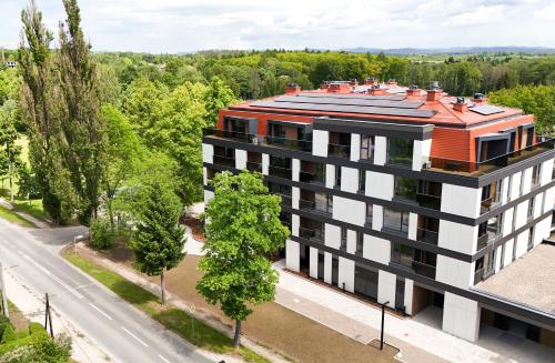 an overhead view of a building with a red roof at Polanica Park in Polanica-Zdrój