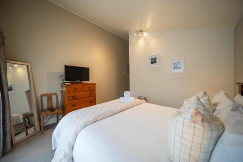 Letto o letti in una camera di Townhouse Retreat - Te Anau Getaway