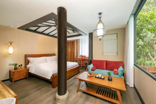 Ένα ή περισσότερα κρεβάτια σε δωμάτιο στο Hoya Hotel Hangzhou West Lake Lingyin Temple Branch