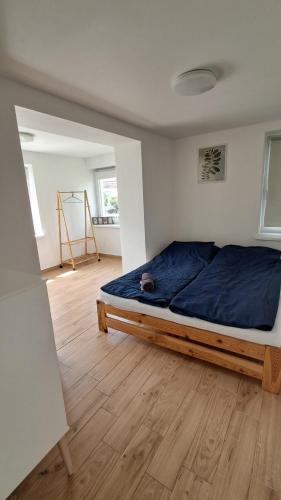 Posteľ alebo postele v izbe v ubytovaní Apartament Biały Domek