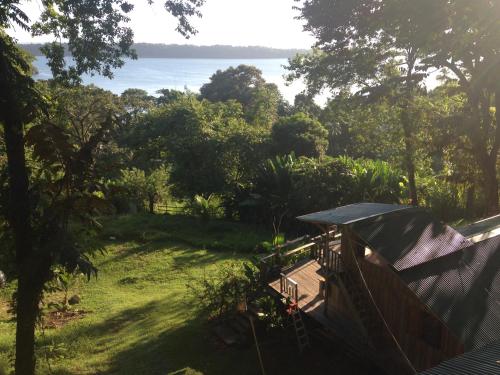 a view of the ocean from the back yard of a tent at Villa ibiscus in Bastimentos