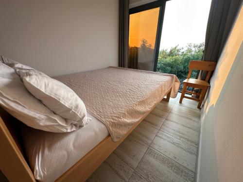 Una cama o camas en una habitación de Glamping Montenegro
