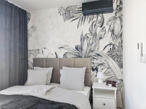 Ένα ή περισσότερα κρεβάτια σε δωμάτιο στο Kairos Apartments -Portos- darmowy parking, klimatyzacja