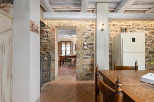 A kitchen or kitchenette at Villa San Michele by PosarelliVillas