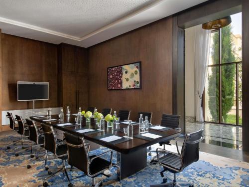 a conference room with a long table and chairs at Fairmont Tazi Palace Tangier in Tangier