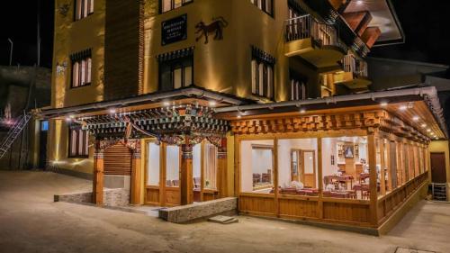 a store front of a building at night at Paro Heritage Hotel in Paro