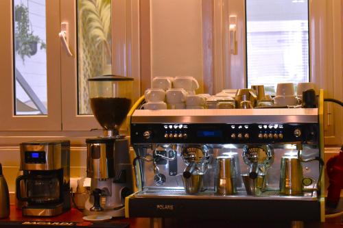Hotel Kosmopolitにあるコーヒーまたはお茶