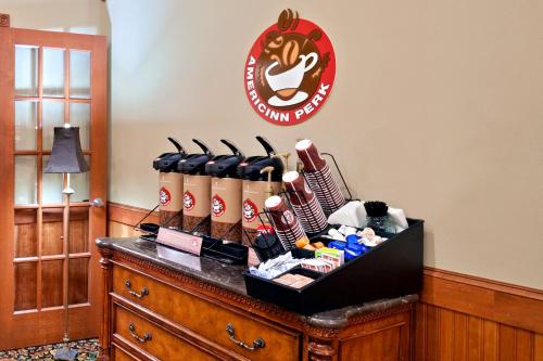a group of beer bottles on top of a table at AmericInn by Wyndham Pampa Event Center in Pampa