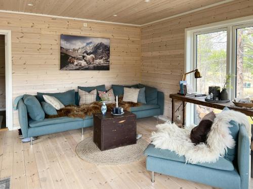 Ruang duduk di Charming Cabin In Jotunheimen
