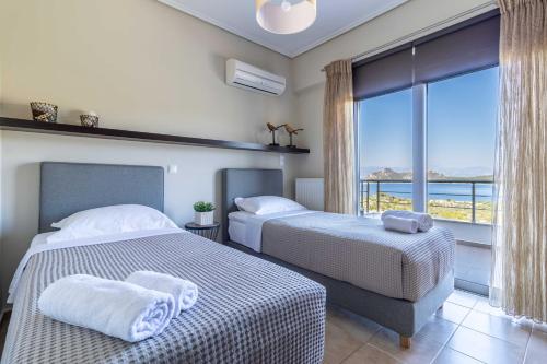 Postel nebo postele na pokoji v ubytování Villa Armonia