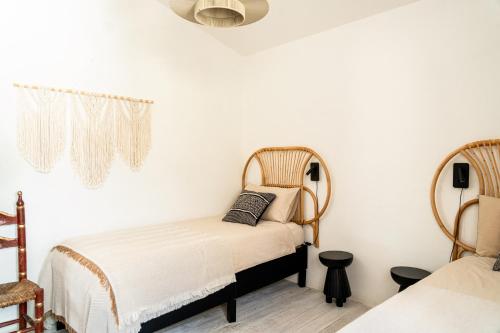 Ένα ή περισσότερα κρεβάτια σε δωμάτιο στο CASA FUILE by casa-orosei