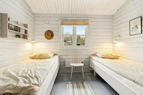 Katil atau katil-katil dalam bilik di Comfortable Summer House In Aabenraa