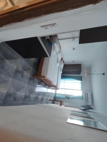 Kuchyň nebo kuchyňský kout v ubytování Thalassion Rooms