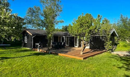 O grădină în afara Familievenligt Sommerhus Ved Lammefjorden