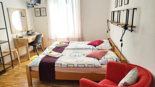 Una cama o camas en una habitación de Hotel Scaletta