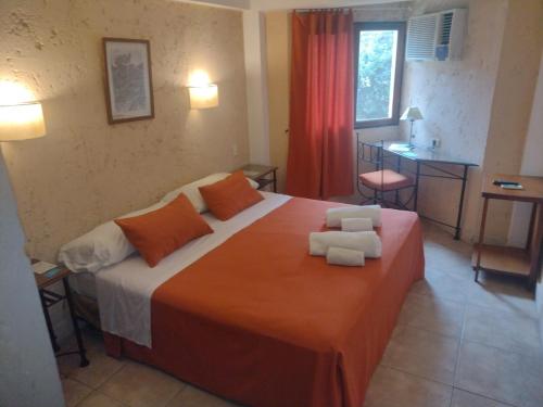 Una cama o camas en una habitación de Hotel Samka