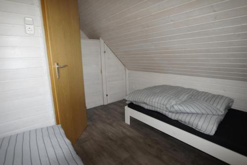 Ein Bett oder Betten in einem Zimmer der Unterkunft Dümmerglück gemütliches und im skandinavischen Still