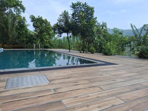 an image of a swimming pool on a house at Dew Drops Nature Villa in Parakaduwa