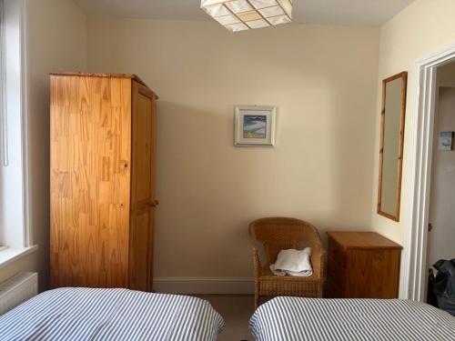 Ein Bett oder Betten in einem Zimmer der Unterkunft The Salt Pot