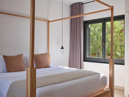 Postel nebo postele na pokoji v ubytování Lena Mare Boutique Hotel