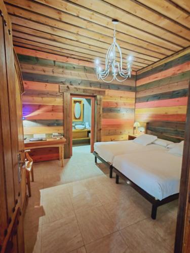 Katil atau katil-katil dalam bilik di Hotel Boutique Palacio de la Serna