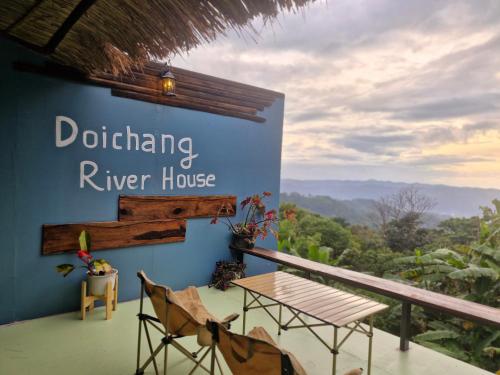 a view from the balcony of a river house at Doichang Riverhouse in Ban Huai Khai