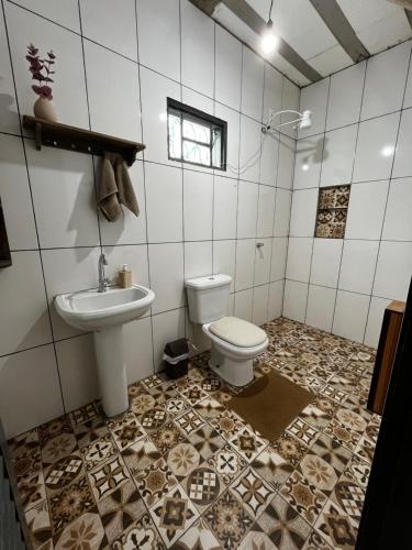 Koupelna v ubytování Casa Oliveira
