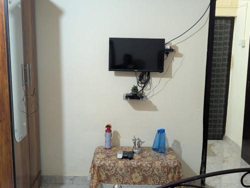 TV a/nebo společenská místnost v ubytování Amritabindu Cottage