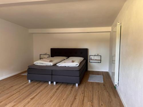 Ένα ή περισσότερα κρεβάτια σε δωμάτιο στο Ferienhaus Hohenleimbach