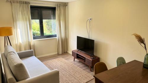 TV a/nebo společenská místnost v ubytování Sapateiro Guest House