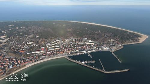 an aerial view of a small island in the water at Baltic Zen II - Apartament in Hel