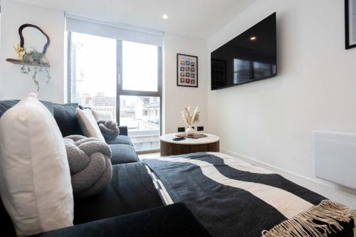 Μια τηλεόραση ή/και κέντρο ψυχαγωγίας στο Supernova Suite & City Views