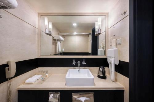 Koupelna v ubytování Hotel Loft Near IGI Airport Delhi