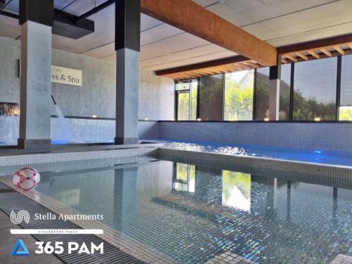 Kolam renang di atau dekat dengan Apartament nr 32 w Mielenku - BASEN ZEWNĘTRZNY, BASEN KRYTY, PLAC ZABAW- 365PAM