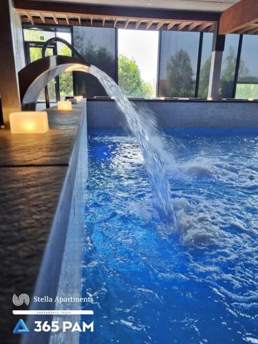 Kolam renang di atau dekat dengan Apartament nr 32 w Mielenku - BASEN ZEWNĘTRZNY, BASEN KRYTY, PLAC ZABAW- 365PAM