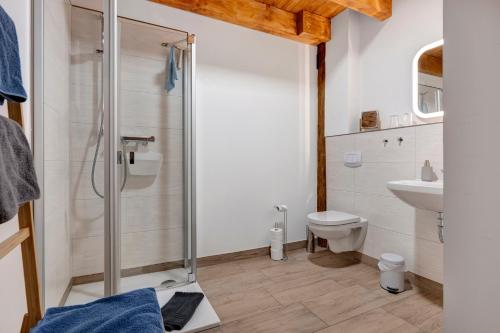 Ένα μπάνιο στο Ferienwohnung Junge 4