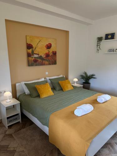 Postel nebo postele na pokoji v ubytování Apartman Ferenac