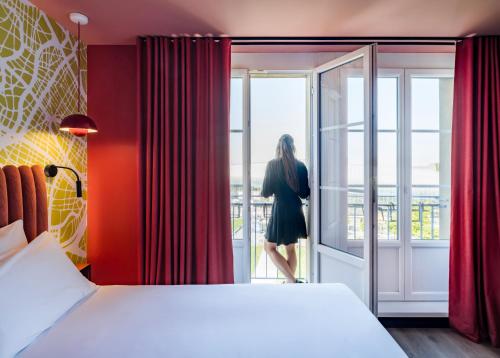 Postel nebo postele na pokoji v ubytování Le Grand Hotel