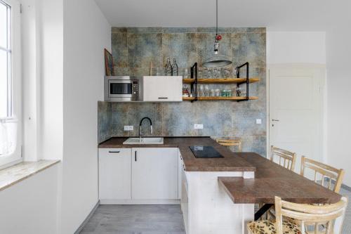 Resort Abertham - apartment Vanessaにあるキッチンまたは簡易キッチン