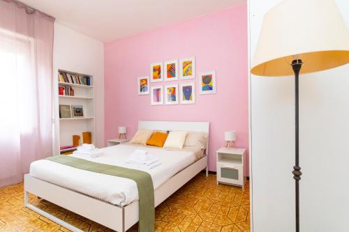 Postel nebo postele na pokoji v ubytování casa a colori